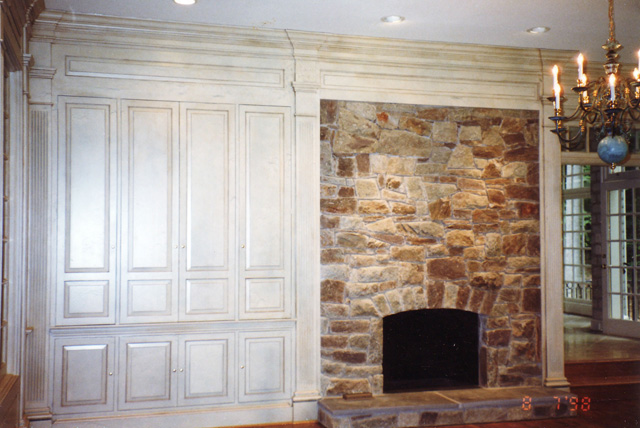 Stone Fireplace and Custom Cabinetry